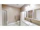 Bathroom with walk-in shower, toilet, and vanity with sink and storage at 112 Salmon River Dr, Durham, NC 27705