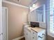 Bathroom with sink and vanity featuring neutral paint and stone counters at 112 Salmon River Dr, Durham, NC 27705