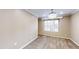 A well lit bedroom with a decorative ceiling light, fresh paint, and lots of natural light at 112 Salmon River Dr, Durham, NC 27705