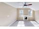 Bedroom featuring neutral paint, a fireplace, carpet and abundant light at 112 Salmon River Dr, Durham, NC 27705
