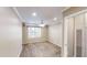 A bright bedroom with a ceiling fan, natural light, fresh paint, and updated flooring at 112 Salmon River Dr, Durham, NC 27705