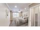 The staged bedroom offers a ceiling fan, window with shutter blinds, and is well lit at 112 Salmon River Dr, Durham, NC 27705