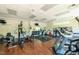 Community gym featuring modern exercise equipment, hardwood floors, and abundant natural light at 112 Salmon River Dr, Durham, NC 27705