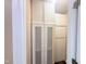 Hallway with several large storage cabinets providing ample storage space at 112 Salmon River Dr, Durham, NC 27705