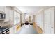 Open kitchen with white cabinetry, stainless appliances and a view into living space at 112 Salmon River Dr, Durham, NC 27705