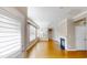 Bright and airy living room featuring a fireplace, built-in shelving, and large windows at 112 Salmon River Dr, Durham, NC 27705
