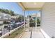 Open, breezy screened porch with neighborhood views, offering a seamless indoor-outdoor experience at 112 Salmon River Dr, Durham, NC 27705