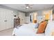 Bedroom featuring a soft color palette, ceiling fan, closet and ensuite at 114 Boone Trl, Garner, NC 27529