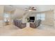 Relaxing bonus room with recliners, TV, and plenty of natural light at 114 Boone Trl, Garner, NC 27529