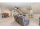 Spacious bonus room includes recliners, desk, and plenty of natural light at 114 Boone Trl, Garner, NC 27529