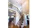 Spacious foyer with hardwood floors, staircase, and a view into the living space at 114 Boone Trl, Garner, NC 27529