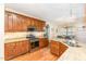 Kitchen with stainless steel appliances, granite countertops, wood cabinets, and eat-in kitchen with an island at 114 Boone Trl, Garner, NC 27529