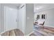 Bright entryway featuring a closet, neutral paint and a dining area with a white table at 1221 Teakwood Pl, Raleigh, NC 27606