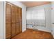 Bedroom with a window, closet, and warm carpeting at 1315 Elder Way, Burlington, NC 27215