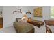Cozy bedroom featuring two beds, unique animal print bedding, and soft neutral carpet at 145 Cofield Cir, Durham, NC 27707