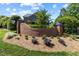 Beautiful brick entrance with manicured landscaping leading to the property at 145 Cofield Cir, Durham, NC 27707