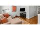 Comfortable living area featuring a couch, media center, and stylish decor at 145 Cofield Cir, Durham, NC 27707