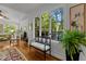 Bright living room featuring hardwood floors, natural light, and stylish decor at 145 Cofield Cir, Durham, NC 27707