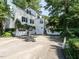 Spacious home exterior featuring a two-car garage and ample parking space at 1512 St. Mary'S St, Raleigh, NC 27608