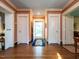 Inviting foyer with hardwood floors, elegant trim, and a bright, welcoming atmosphere at 1512 St. Mary'S St, Raleigh, NC 27608