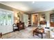 Cozy living room featuring neutral walls, plush carpet, and elegant antique furniture at 1512 St. Mary'S St, Raleigh, NC 27608