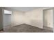 Neutral bedroom featuring neutral carpet, walls, and doorways at 163 Lake Latham Rd, Mebane, NC 27302