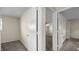Bedroom with doors leading to walk-in closet and hall at 163 Lake Latham Rd, Mebane, NC 27302