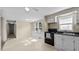 Open kitchen area with natural light, providing an inviting space at 163 Lake Latham Rd, Mebane, NC 27302