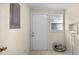 Clean laundry room with a white door, a small window and easy access at 163 Lake Latham Rd, Mebane, NC 27302