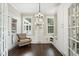 Charming closet with lots of natural light, a chandelier, and ample built-in storage at 164 Avocet Ln, Clayton, NC 27520