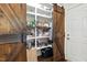Walk-in pantry featuring custom barn doors, ample shelving, and lots of storage space at 164 Avocet Ln, Clayton, NC 27520