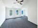 Spacious main bedroom offers ample natural light and a ceiling fan at 17 Ballard Ct, Durham, NC 27712