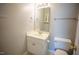 Small bathroom featuring a vanity with a sink and a toilet at 19 Cheltenham Dr, Clayton, NC 27520
