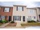 Charming townhome with classic architecture and well-maintained landscaping at 19 Cheltenham Dr, Clayton, NC 27520