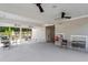 Covered poolside lounge with ceiling fans, offering a comfortable space to relax at 235 N Maple Walk Dr # 220, Garner, NC 27529