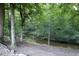 Tranquil view of a creek with tree-lined banks and natural surroundings at 237 Water Front Ln, Timberlake, NC 27583