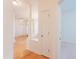 Bright entryway featuring hardwood floors, white columns, and a view into other rooms at 237 Water Front Ln, Timberlake, NC 27583