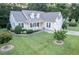 Beautiful home with a well-kept lawn, a covered front porch, and two-car garage at 237 Water Front Ln, Timberlake, NC 27583