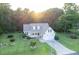 Well-maintained home with a manicured lawn and two-car attached garage at 237 Water Front Ln, Timberlake, NC 27583