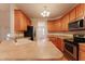 Kitchen with an island, stainless steel appliances, and a view to the dining room at 237 Water Front Ln, Timberlake, NC 27583