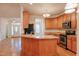Open kitchen with an island, stainless steel appliances, and lots of cabinet space at 237 Water Front Ln, Timberlake, NC 27583