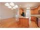Spacious kitchen with an island, breakfast bar, and open access to dining area at 237 Water Front Ln, Timberlake, NC 27583