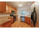 Well-lit kitchen features stainless steel appliances and plenty of counter space at 237 Water Front Ln, Timberlake, NC 27583