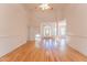Spacious open-concept living area with hardwood floors, ready for your personal touch at 237 Water Front Ln, Timberlake, NC 27583