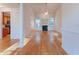 Spacious living area featuring hardwood floors, fireplace, and access to the kitchen at 237 Water Front Ln, Timberlake, NC 27583