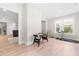 Versatile bonus room with gym equipment and hardwood style flooring at 2720 Spotted Coral Ct, Apex, NC 27502