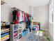 Walk-in closet with clothes racks, shelving, and a colorful play area at 2720 Spotted Coral Ct, Apex, NC 27502