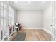 Bright office space featuring French doors, light wood floors, and neutral walls at 2720 Spotted Coral Ct, Apex, NC 27502