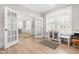 Bright office space featuring French doors, light wood floors, and neutral walls at 2720 Spotted Coral Ct, Apex, NC 27502