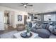 Comfortable living room with modern furnishings, open to the kitchen and dining areas at 273 Broomside Ave, Raleigh, NC 27603